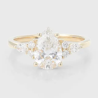 Choosing Blossom Oval- and Pear-Cut Lab Diamond 18K Yellow Gold Trilogy Engagement Ring